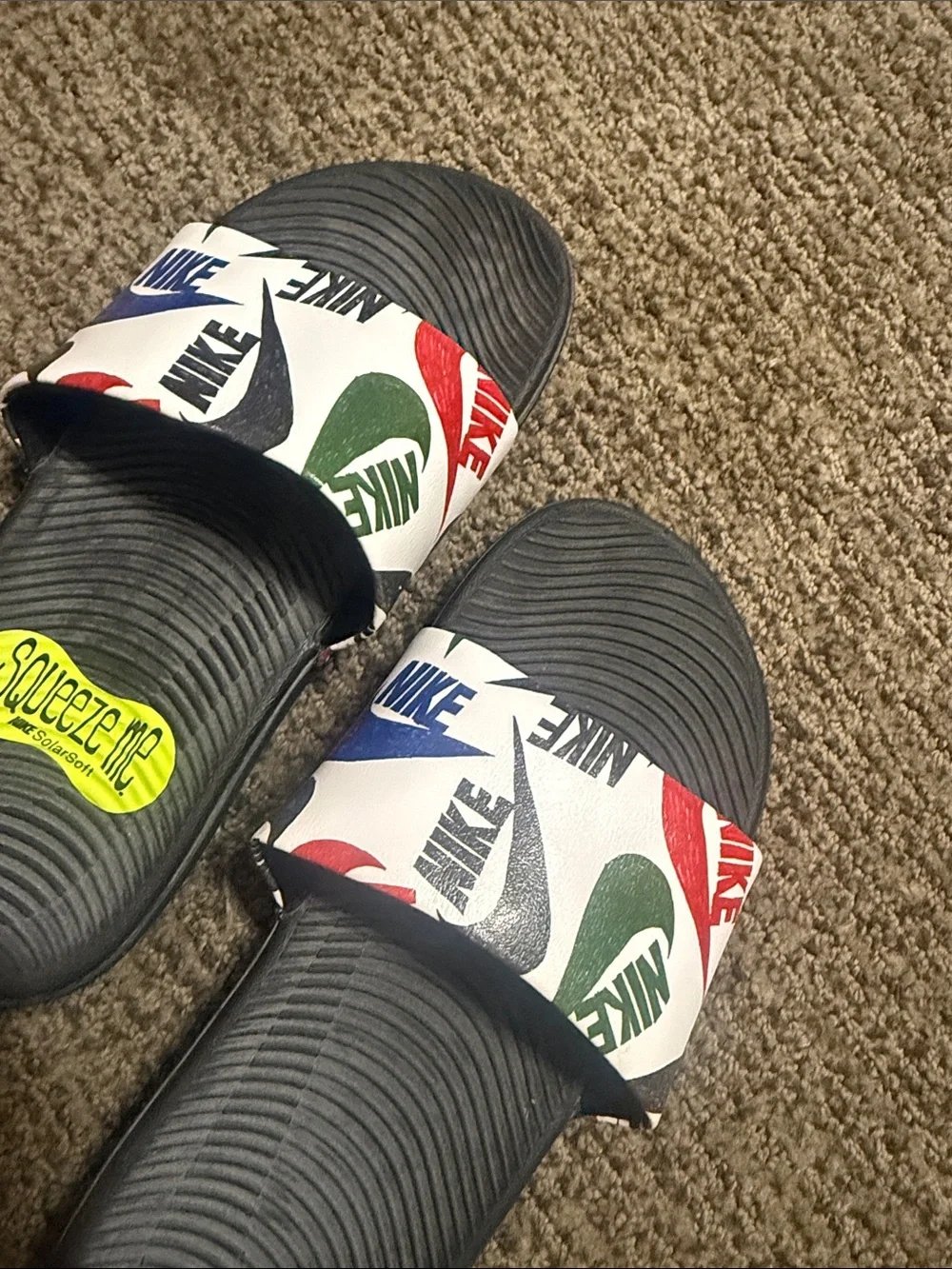Nike Kids Black Slide Sandals with Red Green and Blue Logo Strap